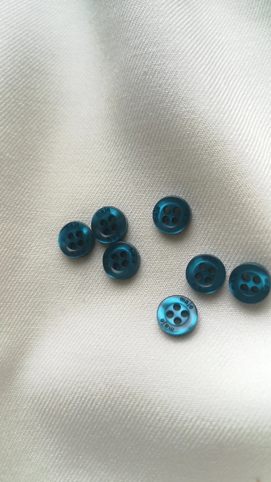 Boutons bleu canard 9mm (vendu par 10)