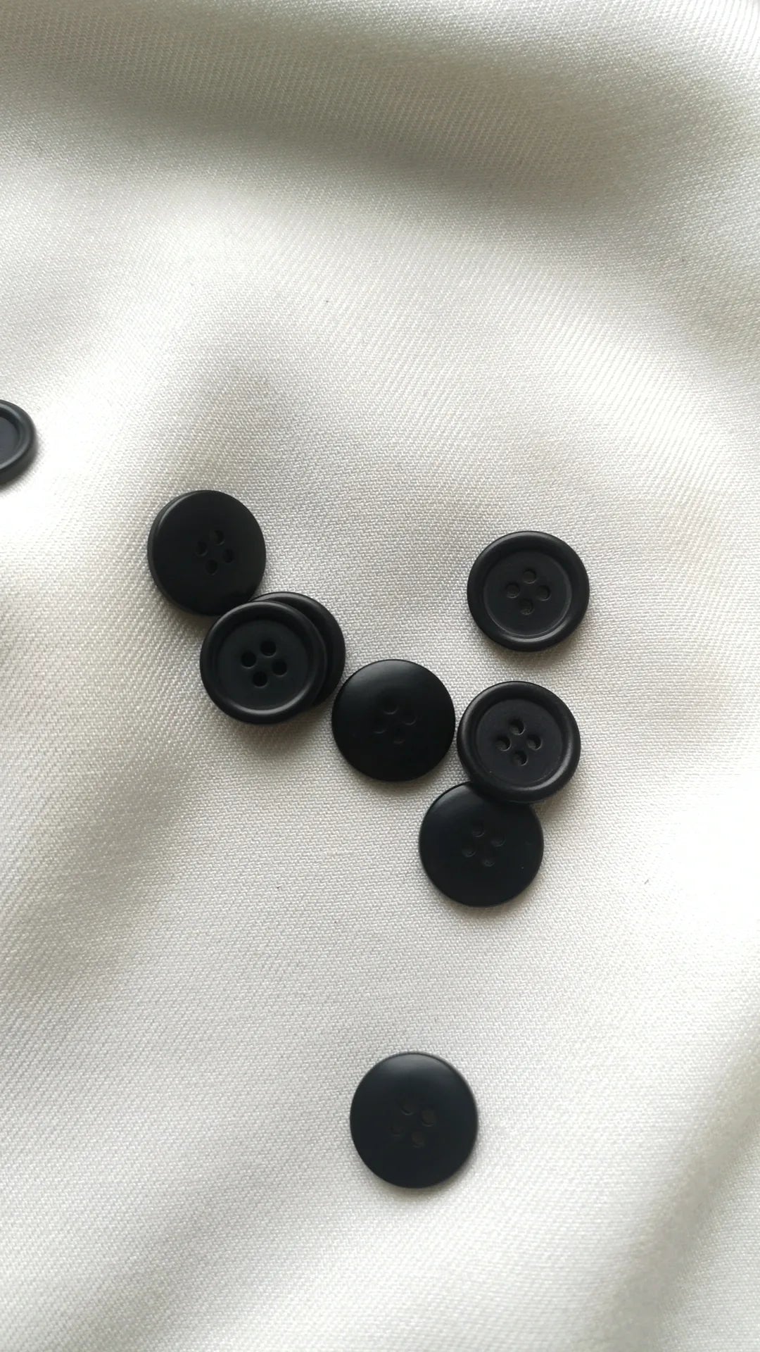 Boutons noirs 15mm (vendu par 10)