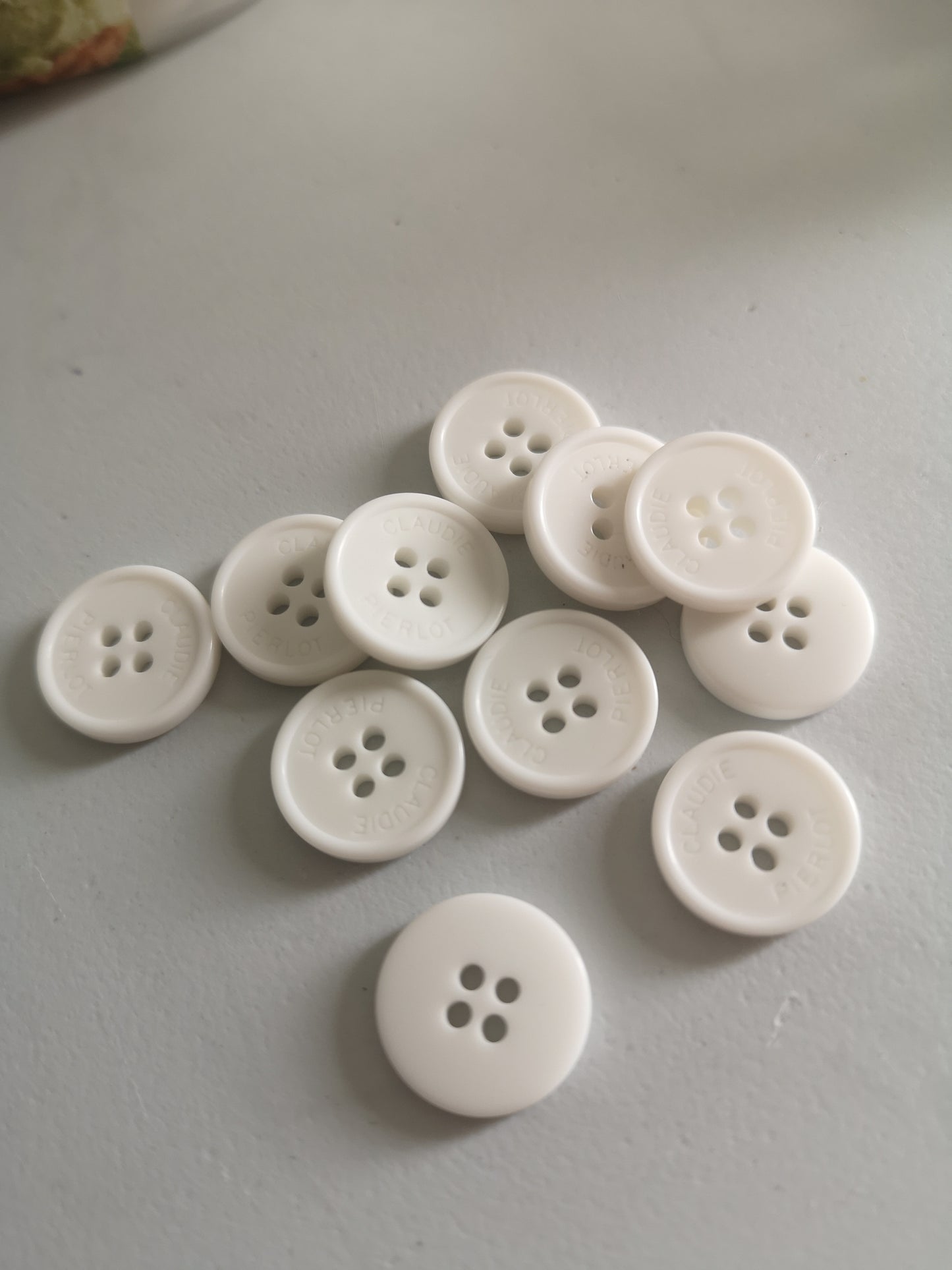 Boutons blanc ivoire CP 14mm (prix par 10)